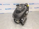a picture of a small engine on a table in front of a wall