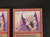 two cards that are sitting on a table
