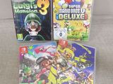 quelques jeux Nintendo Wii posés sur un canapé