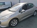 a picture of a silver car parked in a parking lot