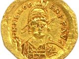 une pièce d'or portant l'image d'un homme