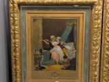 two framed paintings of a man and a woman in a bedroom