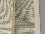 an open book that is sitting on a table