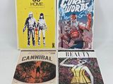 three comics are sitting on top of each other in front of a white background