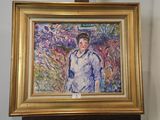 un tableau représentant une femme debout devant un mur