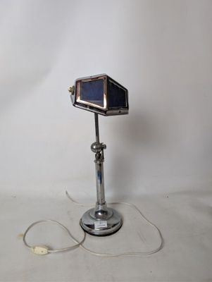 a small lamp that is sitting on a table
