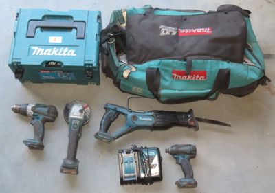 tools that are sitting on the floor next to each other