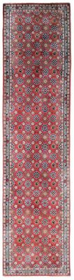 un tapis rouge et bleu à motifs