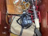 a brown box filled with assorted items in it