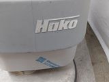 a close up of a bathroom sink with the name hero written on it