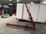 an image of a large white box truck in a warehouse