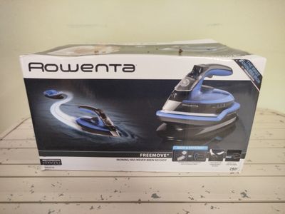 1 centrale vapeur de marque ROWENTA - Modèle : Freemove - Photo 1