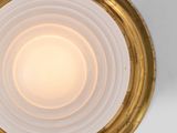 a close up of a light that is on a wall