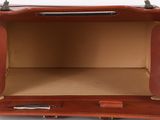 an open brown briefcase with a pen and paper inside of it