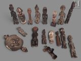 a lot of wooden figurines that are on the table