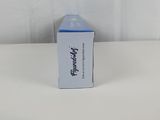 a white box with a blue lid sitting on top of a table