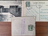 many old postcards on a table with a pen and ink