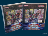 they are two packs of yu gi oh booster cards on a blue background