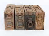 several old suitcases are stacked on top of each other on a white surface