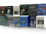 a lot of books that are stacked together on a shelf