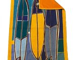 yellow and blue beach towel with three surfboards on a blue and yellow background