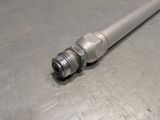 an image of a close up of a pipe on a metal surface