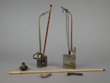 two different types of tools that are sitting on a table