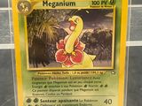 une carte Pokémon sur laquelle figure l'image d'un oiseau jaune