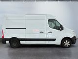 a picture of a white van parked in a garage
