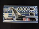 a box with a model train on it on a table