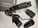 an image of a hair clipper and a charger on a table