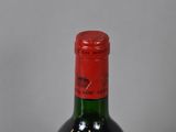 a bottle of wine that is sitting on a table