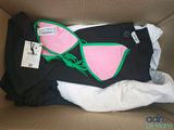 a box that has a bikini and panties inside of it