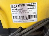 the back end of a yellow machine with a barcode on it