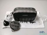 a black and white bag that is sitting on a table