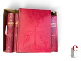 an image of a red book sitting on top of a book case
