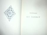 un livre ouvert sur lequel figure l'image d'un diamant