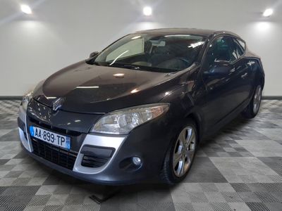 a picture of a car that is parked in a garage