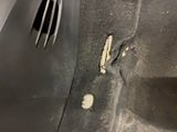 a car door handle with a hole in it