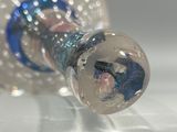 a close up of a glass object on a table