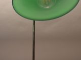 an image of a green table lamp on a metal stand