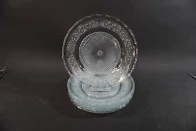 a glass plate on a stand on a table
