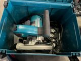 a blue box that has a drill in it