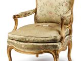 an image of a chair with a floral upholstered seat