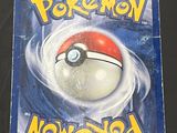 a pokemon card with a poke ball on it