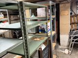 many shelves that are in the middle of a room