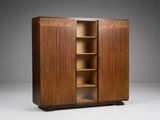 a wooden cabinet with shelves and shelves on top of it