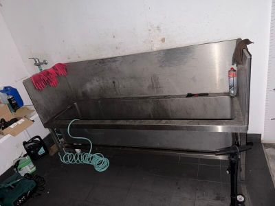 an image of a stainless steel bench in a room