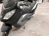 a scooter that is parked in a parking lot
