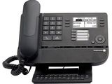a telephone that is sitting on top of a desk